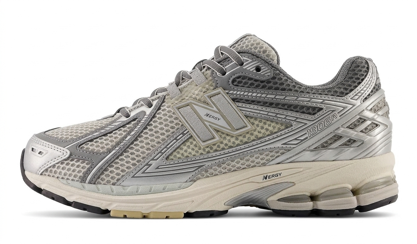کفش پیاده‌روی و رانینگ مردانه نیوبالنس (New Balance) مدل 1906R رنگ طوسی و نقره‌ای - سری میراث با تکنولوژی N-ergy