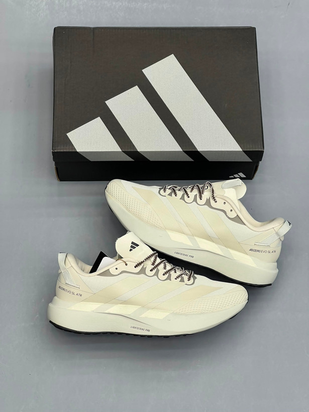 کفش دویدن مردانه آدیداس مدل Adizero Evo SL فوم لایت استرایک پرو کرم استخوانی